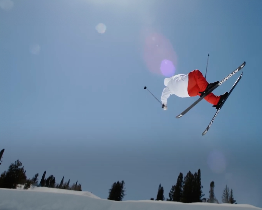 skiier doing a trick in the air